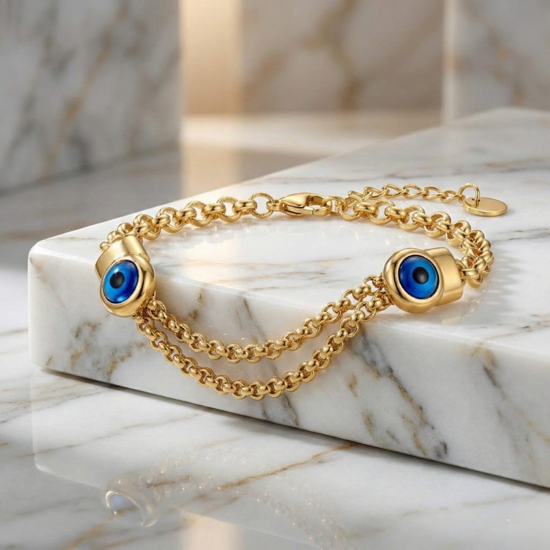 A stylish gold bracelet made of rust-resistant stainless steel, with two interlocking chains and a double "blue eye" design for a modern look, with an adjustable clasp to fit you. - Image 5